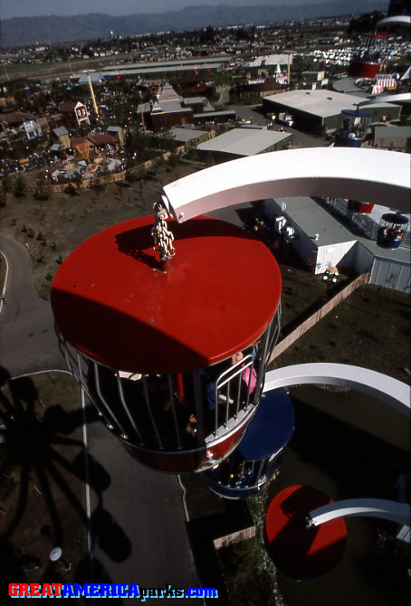 on Sky Whirl
Santa Clara, CA -- 1976
Here is an on-ride view from the Sky Whirl. Just above the roof of the red cabin in the background is the Saskatchewan Scrambler ride.
