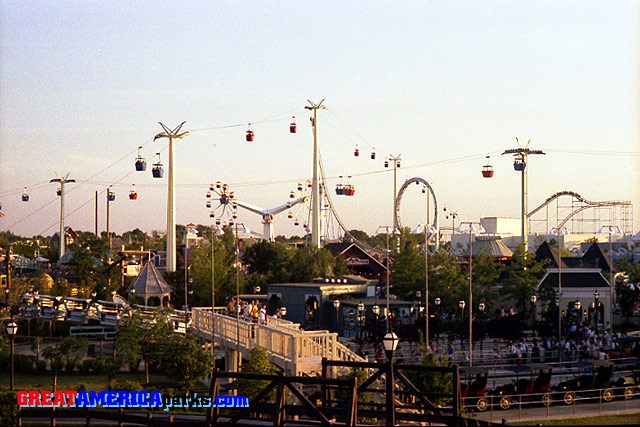 view from train
Gurnee, IL -- 1978
This view from the GREAT AMERICA Scenic Railway gives an idea of the distance covered by the Southern Cross. Visible near the bottom of the Southern Cross' first tower is the gazebo-like structure that marked the entrance to the Southern Cross.
Keywords: Gurnee