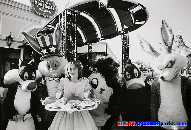 1981 Levee Spaghetti character breakfast
Gurnee, IL

START OFF A DAY OF FAMILY FUN AT GREAT AMERICA by having a delicious breakfast with Bugs Bunny, Great America's official host. Here Bugs and some of his mischievous pals look on hungrily as a Great America hostess at the Levee Spaghetti Restaurant displays some of the yummy breakfast entrees served up daily at the Levee. Bugs will join guests for a hearty breakfast every morning at the Levee, then get them started on their full day of family fun. Marriott's Great America, located in Gurnee, Illinois, midway between Chicago and Milwaukee on Interstate 94, will open for its sixth season of fun on Saturday, May 2. The park will then be open weekends only, 10:00 AM to 8:00 PM, through May 17. Daily operation begins May 23rd.

