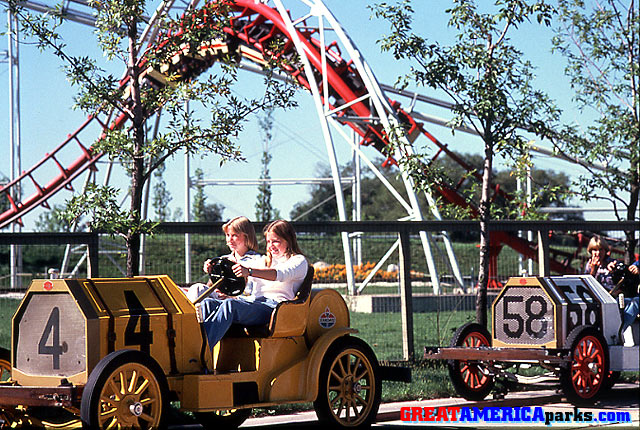 speedway scenery
Gurnee, IL
Riders on the Barney Oldfield Speedway were treated to great views of the [i]Turn of the Century[/i] roller coaster. Standard Oil logo on car indicates that this is Gurnee.
Keywords: Gurnee