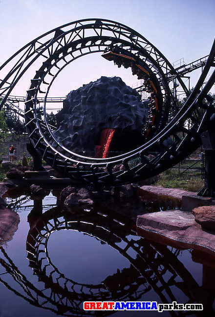 [i]Demon[/i] corkscrew
Santa Clara, CA
On the left, a guest views the Demon corkscrew from the observation area that was a feature exclusive to Santa Clara. Today, the Santa Clara observation area is closed while expanded access near the Gurnee corkscrew was opened with the addition of the Southwest Territory.
