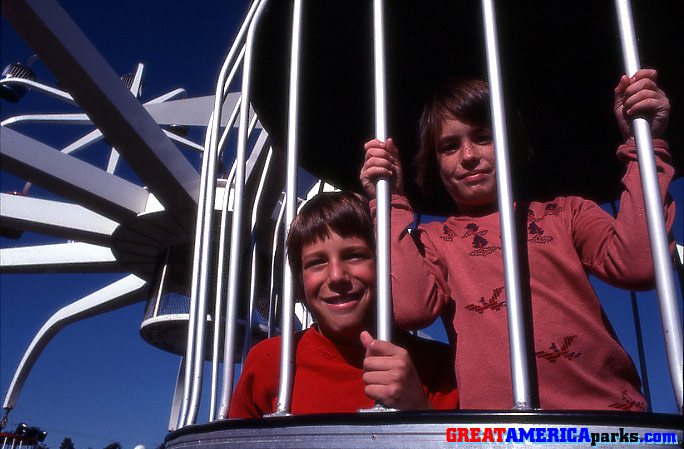 ready to whirl
Two young riders are happy about going for a spin on Sky Whirl.
