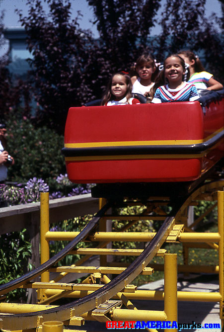 Gulf Coaster
Four lovely young ladies enjoy a thrilling ride in the first car of the [i]Gulf Coaster[/i].
