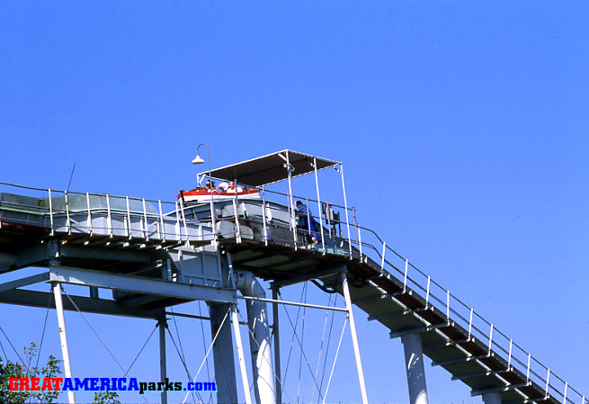 Yankee Clipper second lift
This is a view of the top of the second lift. The second lift used two belts, an upper and a lower, to carry boats to the upper flume. The Yankee Clipper employee at this station is supposed to count the wheels on each boat as it passes by.
